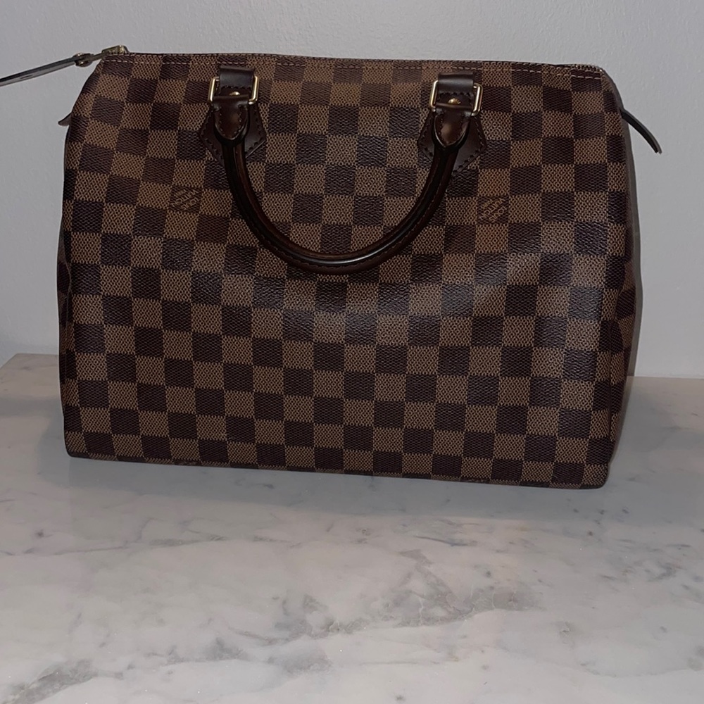 Brand new speedy 30! Comes with box and receipts! Full set (lock and key)!!